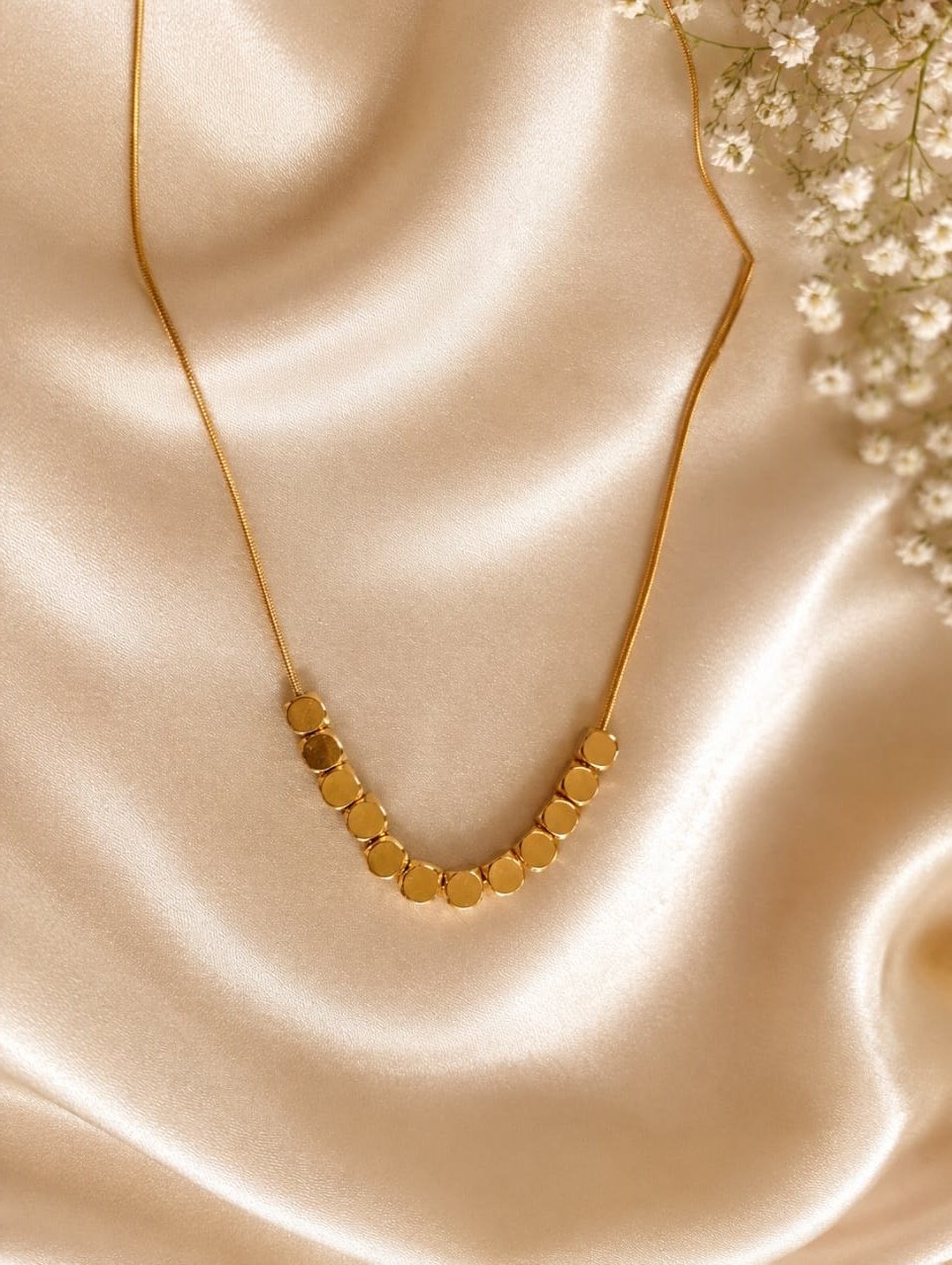 Gold crescent necklace