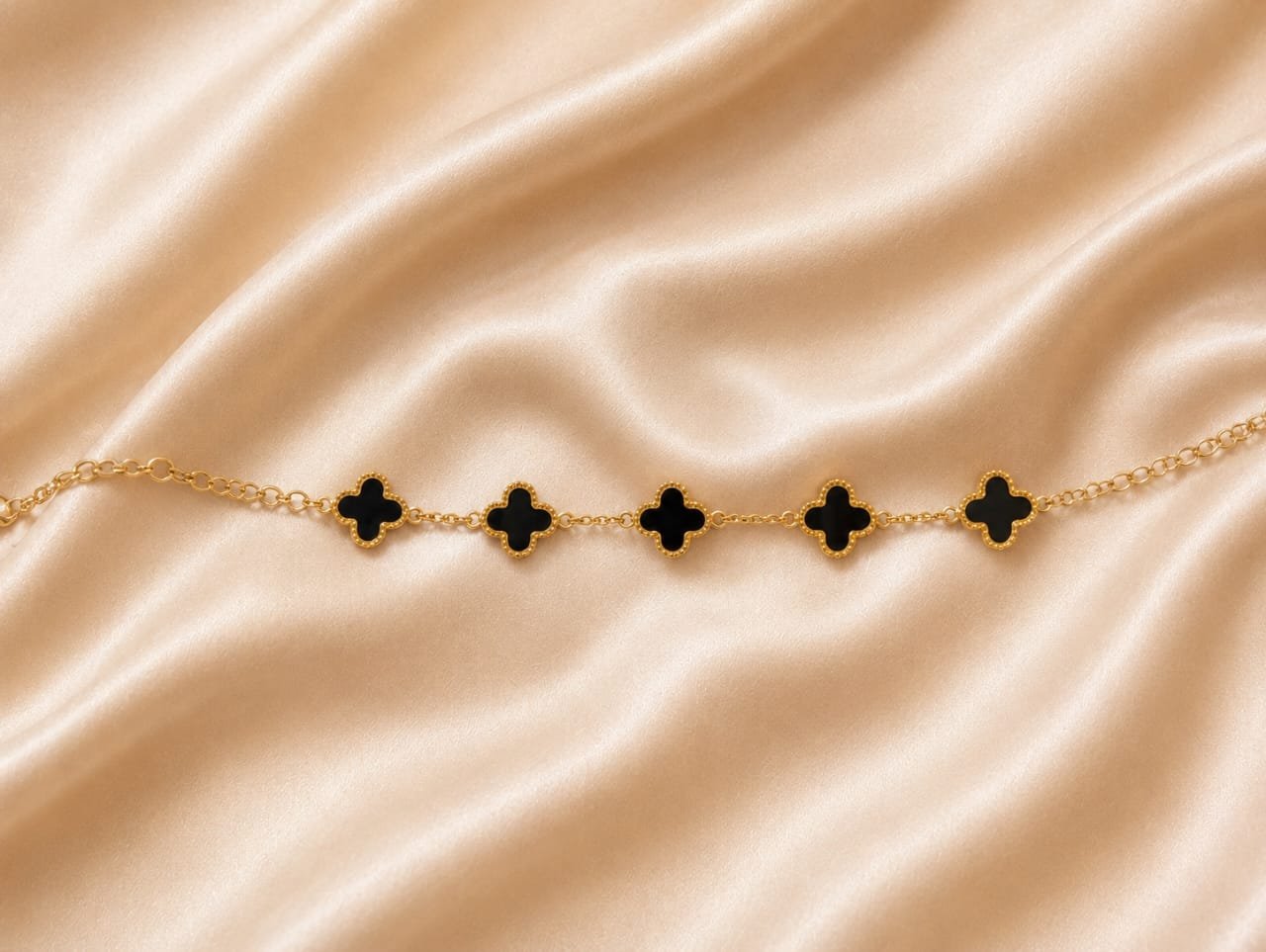 Black Clover Gold-Tone Charm Bracelet